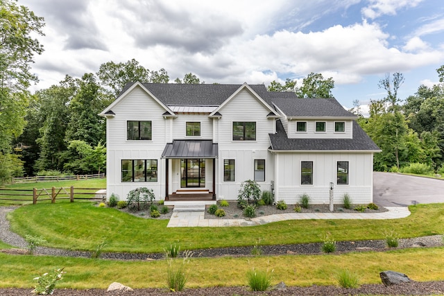 modern farmhouse with a front yard