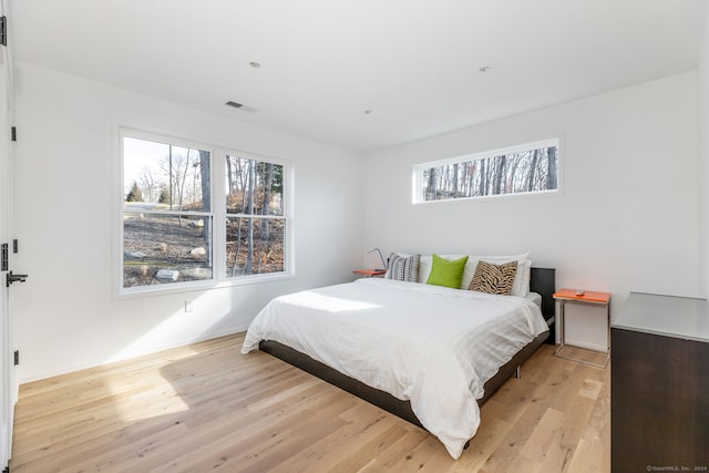 bedroom featuring light hardwood / wood-style floors