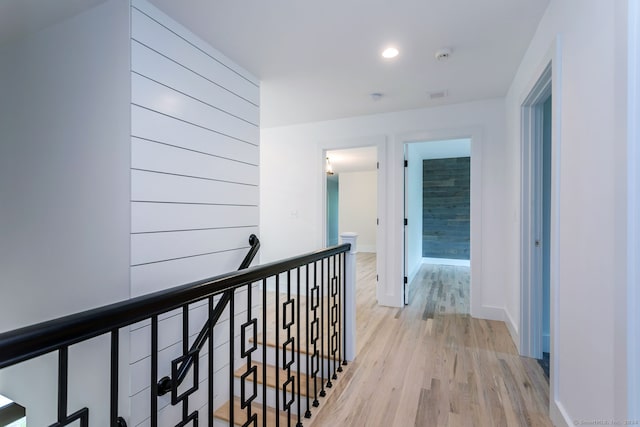 corridor featuring light hardwood / wood-style floors