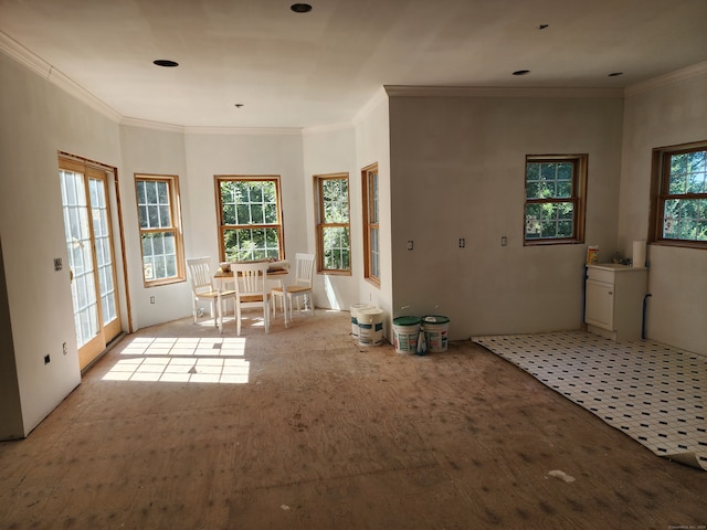 interior space with crown molding