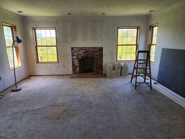 unfurnished living room with ornamental molding and a fireplace