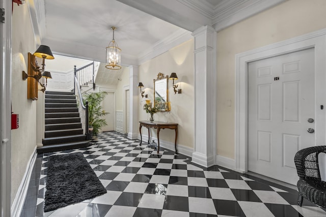 5 Hundley Ct Apt 1C, Stamford, CT 06902 - entrance foyer with ornate columns, stairway, a chandelier, and crown molding