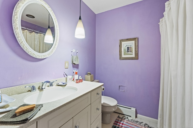 110 William St, Norwalk, CT 06851 - full bath with a baseboard radiator, toilet, tile patterned floors, vanity, and baseboards