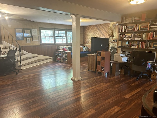 110 William St, Norwalk, CT 06851 - below grade area featuring wood walls, wood finished floors, stairs, and a desk
