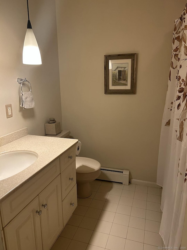 110 William St, Norwalk, CT 06851 - bathroom with baseboard heating, vanity, and tile patterned flooring