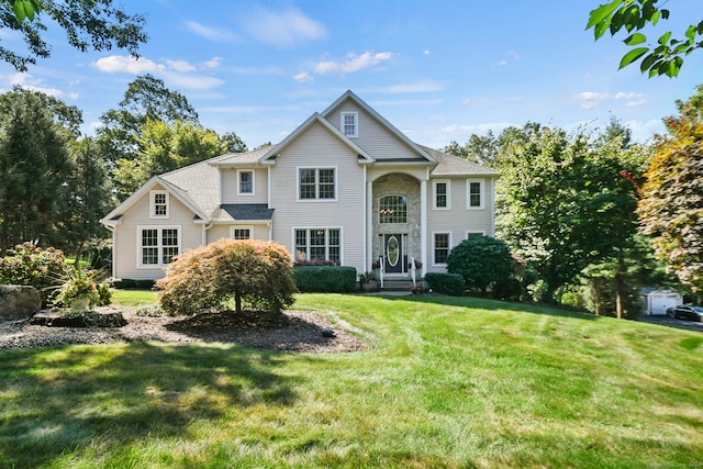 view of front facade featuring a front yard