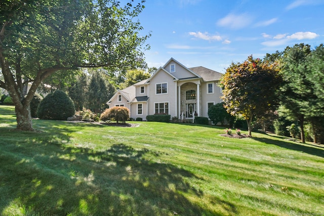 view of front of property with a front lawn