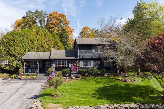 view of front of home with a front lawn