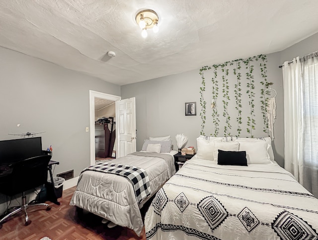 bedroom with a textured ceiling