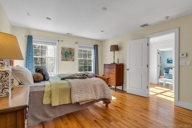 bedroom with light wood-type flooring