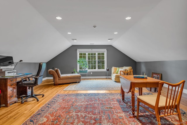 office area featuring light hardwood / wood-style flooring and lofted ceiling