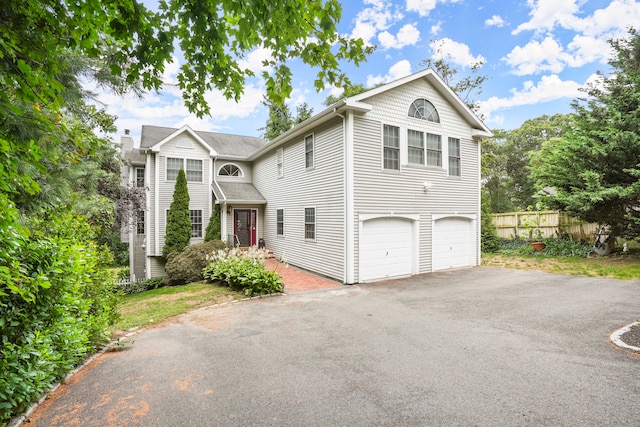 view of property with a garage