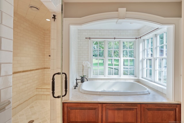 bathroom with independent shower and bath