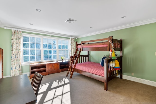 bedroom featuring crown molding and carpet flooring