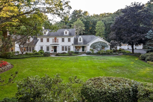 view of front of home with a front yard