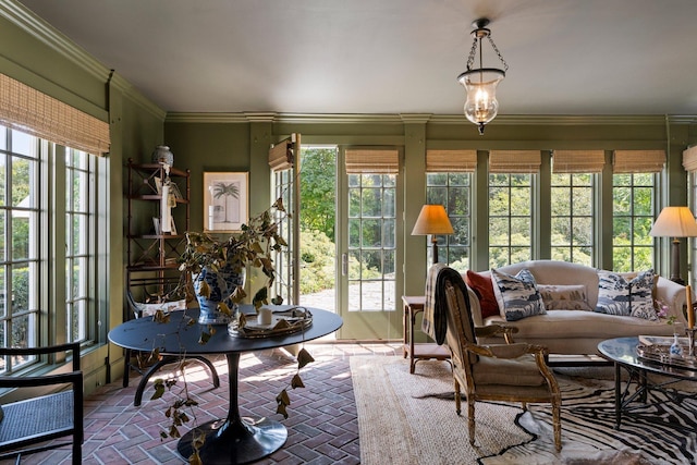 44 S St, Roxbury, CT 06783 - living area featuring plenty of natural light, brick floor, and ornamental molding