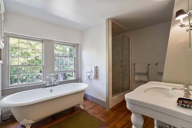 44 S St, Roxbury, CT 06783 - full bath with a sink, a freestanding tub, a shower stall, and hardwood / wood-style floors