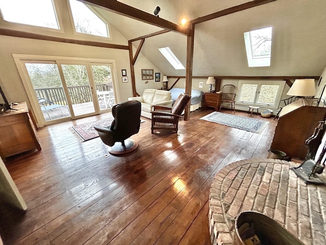 148 Flanders Rd, Woodbury, CT 06798 - bedroom featuring a skylight, access to outside, wood-type flooring, and high vaulted ceiling