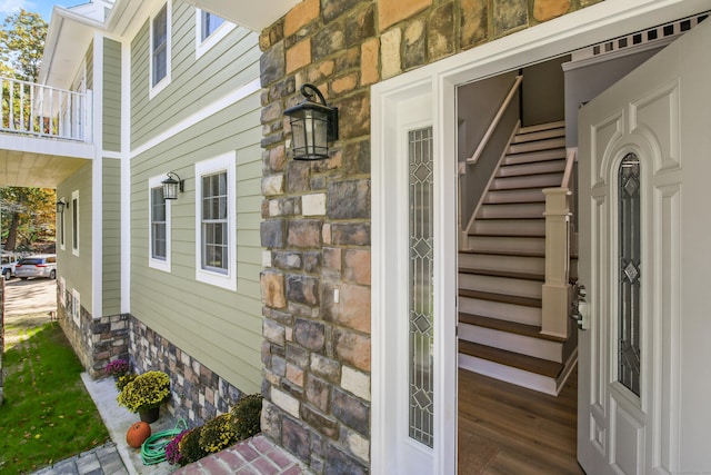 property entrance with a balcony