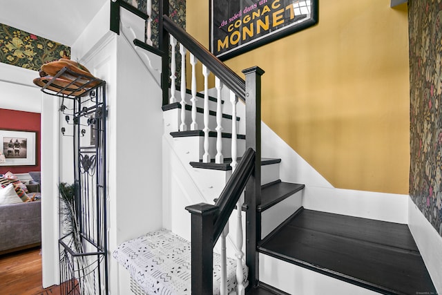 stairway featuring hardwood / wood-style flooring