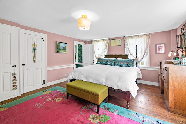 bedroom featuring dark hardwood / wood-style floors