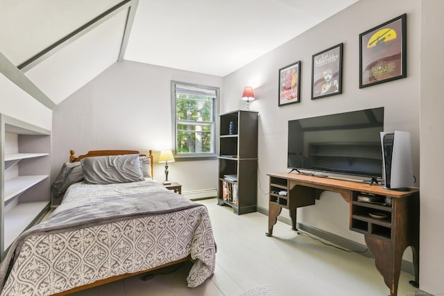 bedroom featuring lofted ceiling and a baseboard heating unit