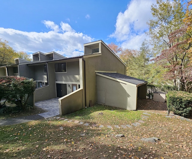 back of property with a patio area