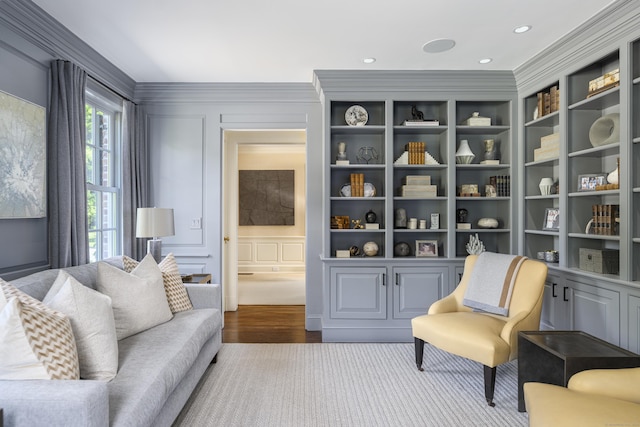 865 Hollow Tree Ridge Rd, Darien, CT 06820 - living area with a decorative wall, wood finished floors, and crown molding
