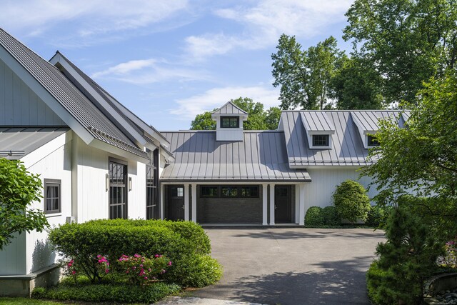 865 Hollow Tree Ridge Rd, Darien, CT 06820 - view of front facade featuring a standing seam roof and metal roof