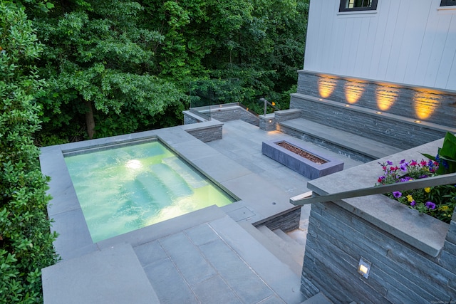 view of swimming pool with a patio area