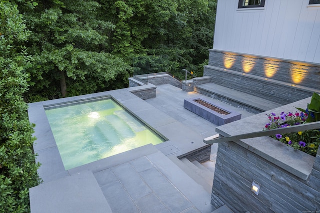 865 Hollow Tree Ridge Rd, Darien, CT 06820 - view of swimming pool featuring a patio area, an in-ground hot tub, and a fire pit