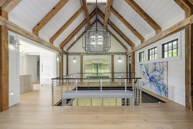 865 Hollow Tree Ridge Rd, Darien, CT 06820 - hall featuring a chandelier, wooden walls, wood-type flooring, high vaulted ceiling, and beamed ceiling