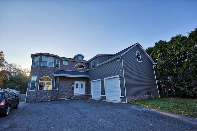 view of front property with a garage