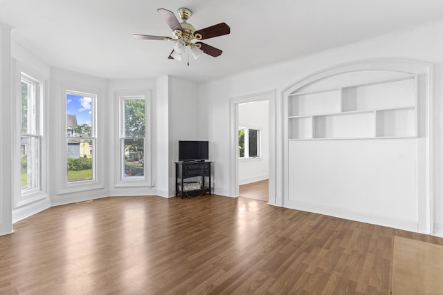 85 Aetna St Apt 12, Naugatuck, CT 06770 - unfurnished living room featuring a ceiling fan, wood finished floors, and baseboards