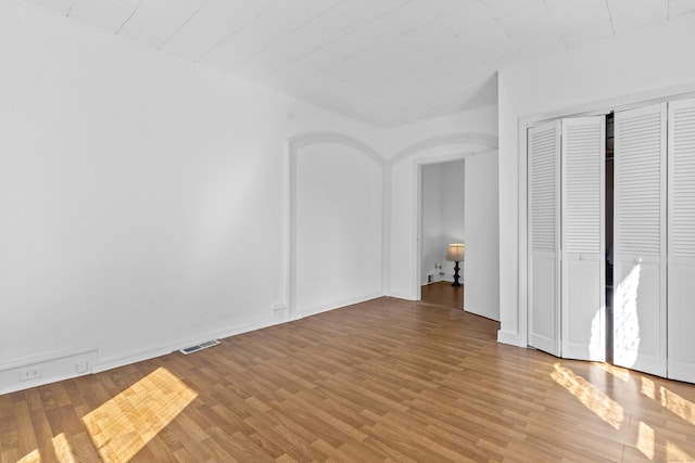 85 Aetna St Apt 12, Naugatuck, CT 06770 - unfurnished bedroom featuring light wood-style flooring and a closet