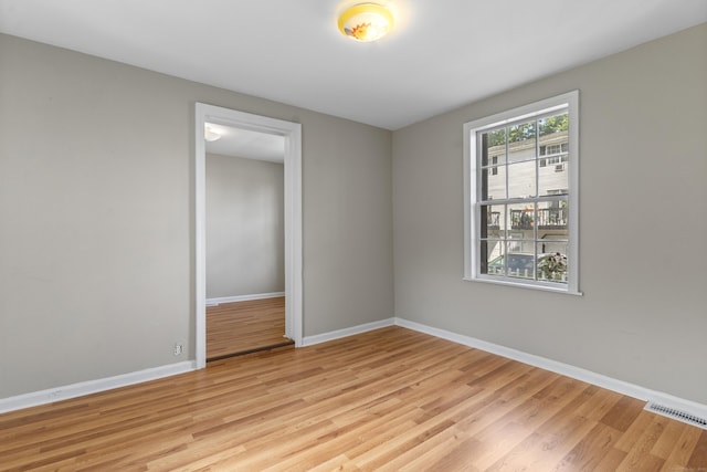 85 Aetna St Apt 12, Naugatuck, CT 06770 - spare room featuring light wood-style floors and baseboards