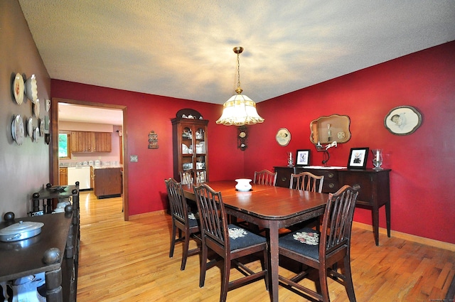 dining room featuring light hardwood / wood-style flooring