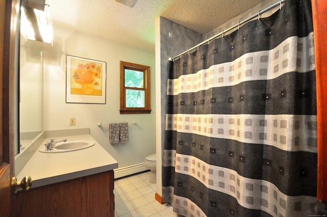 bathroom featuring vanity, a textured ceiling, a baseboard heating unit, tile patterned flooring, and toilet