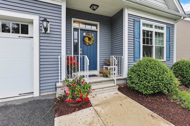 doorway to property with a porch