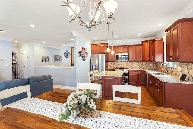 dining area with ornamental molding, dark wood-type flooring, and sink