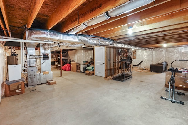 basement featuring heating unit