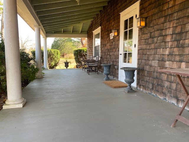 view of patio featuring a porch