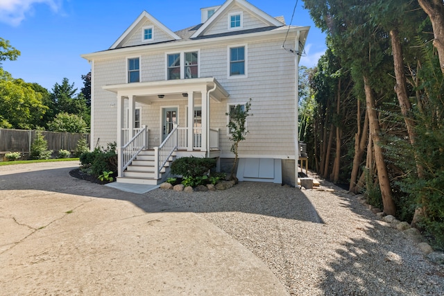 view of front of property featuring covered porch