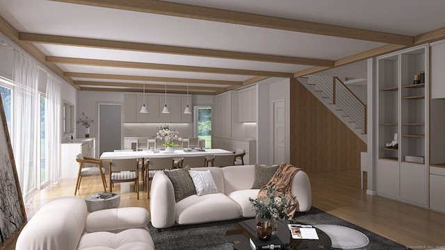 living room featuring light hardwood / wood-style flooring and beamed ceiling