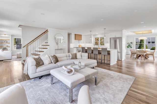 living room with light hardwood / wood-style floors