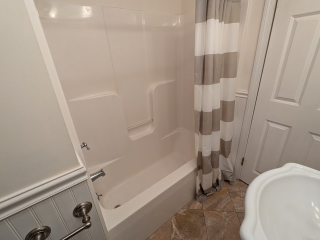 bathroom featuring shower / bathtub combination with curtain