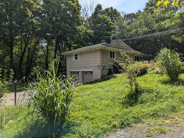 exterior space with a garage