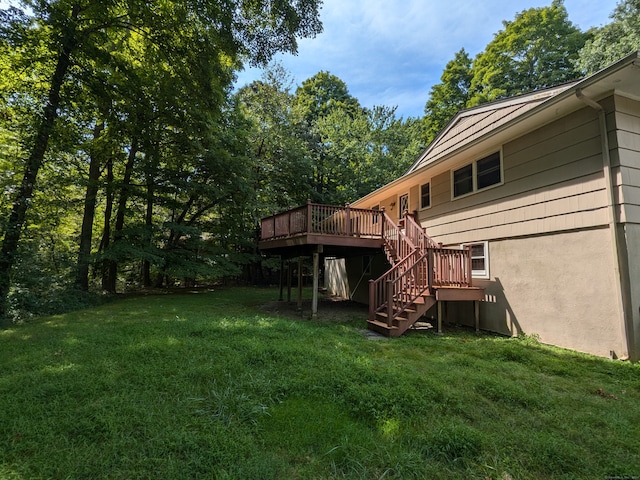 view of yard with a wooden deck