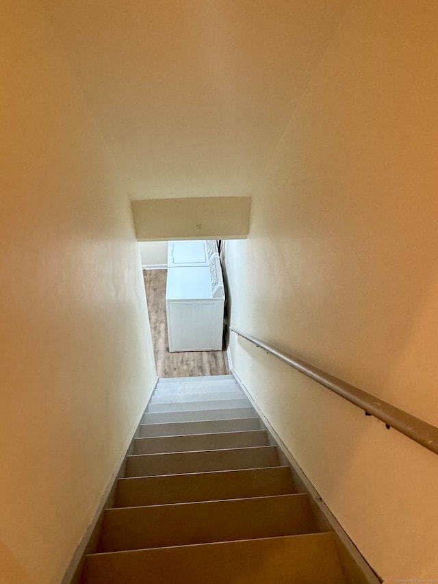 stairway with wood-type flooring