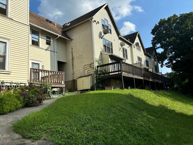 exterior space featuring a wooden deck